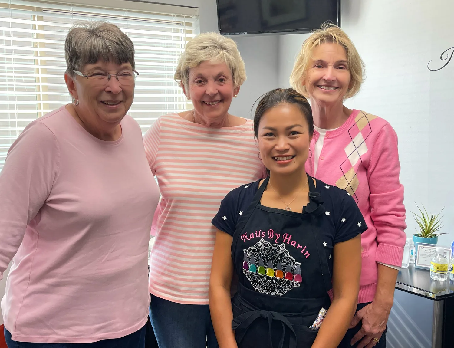 Harin with happy returning clients at Ultimate Beauty Salon in Durham